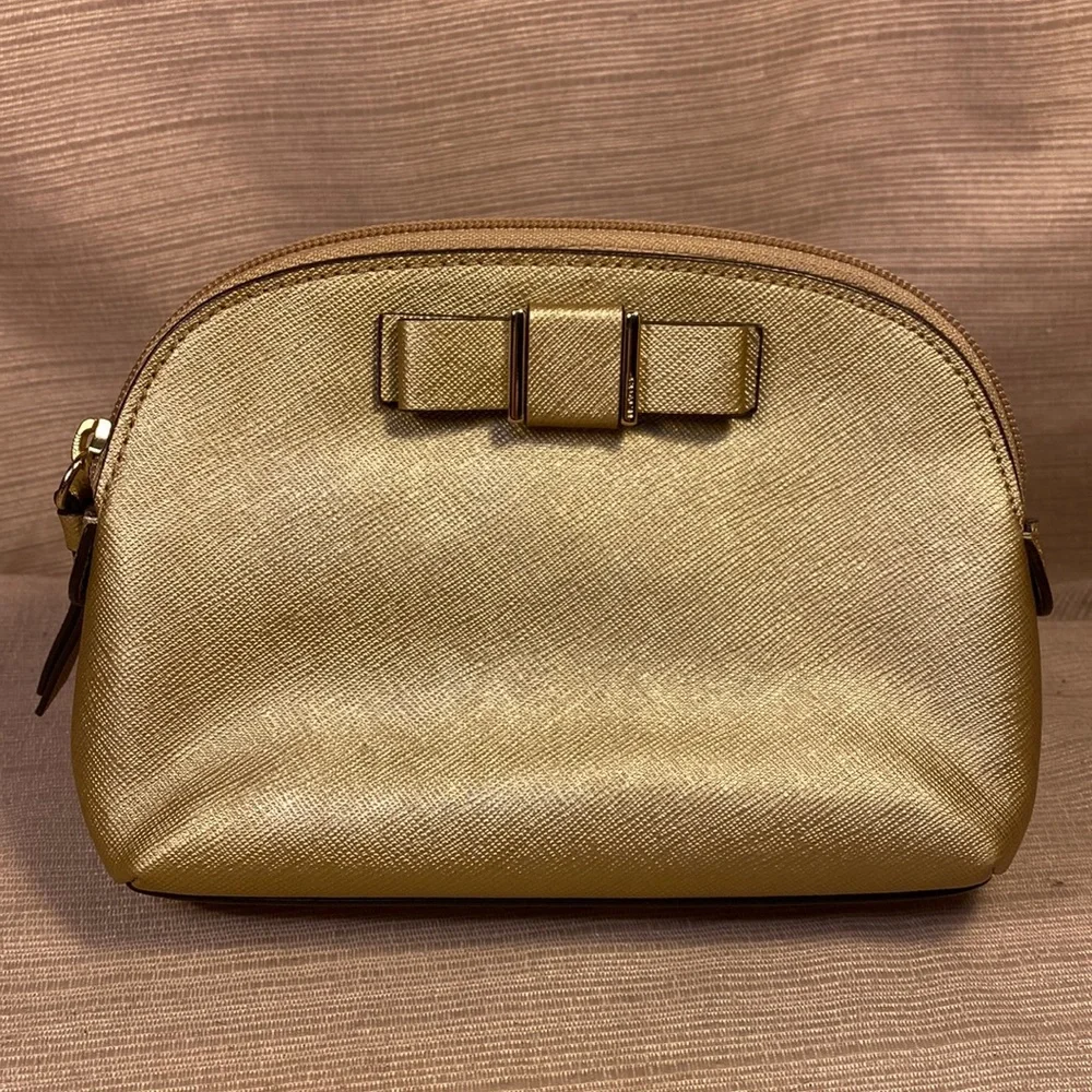 Coach gold metallic color cosmetic pouch w/elegant bow